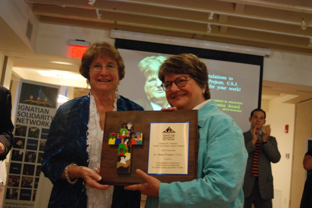 Loretta Holstein and Sr. Helen Prejean with the Robert M. Holstein Award plaque